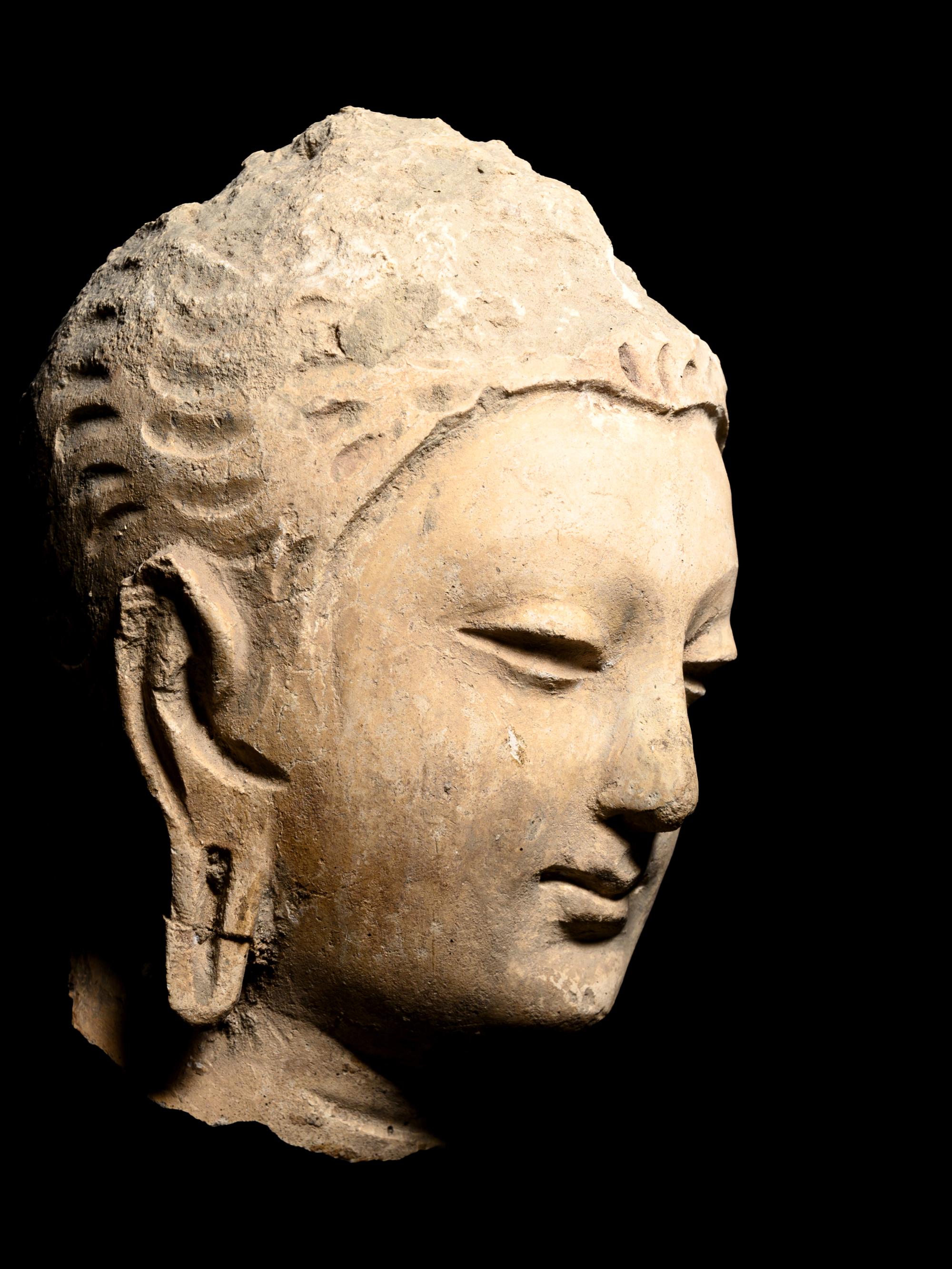 Four Gandharan Stucco Fragmented Heads