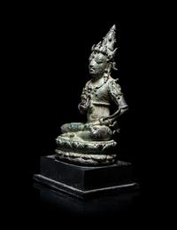 A Small Indonesian Bronze Figure of a Female Retinue