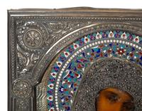 A Russian Silver and Enamel Oklad Icon