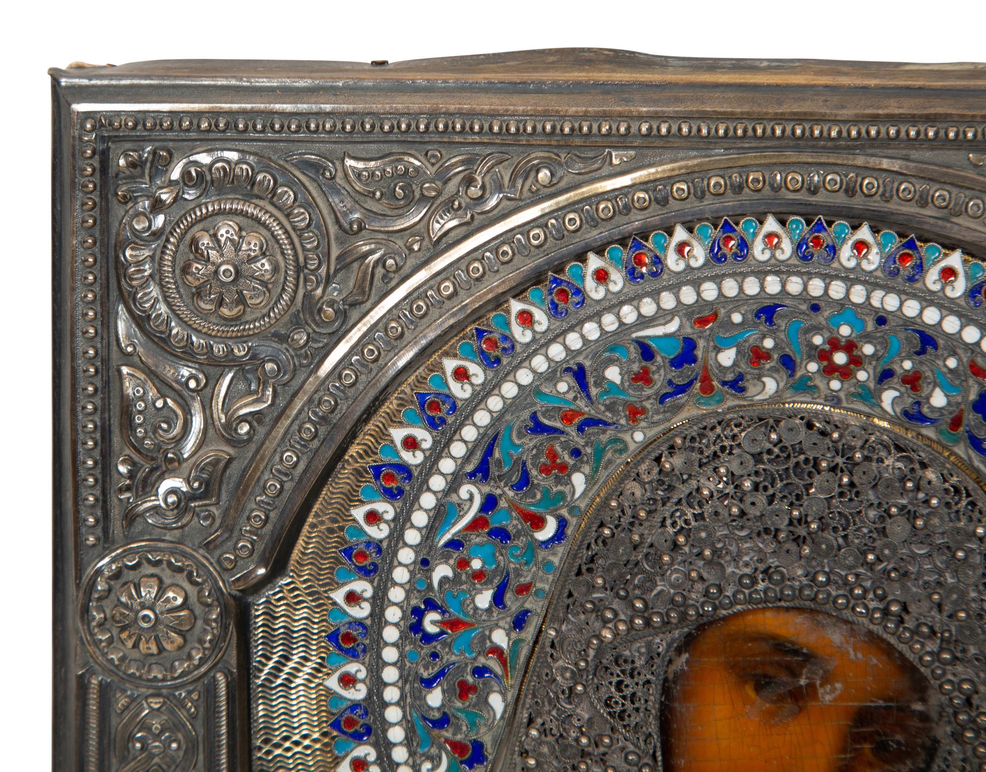 A Russian Silver and Enamel Oklad Icon