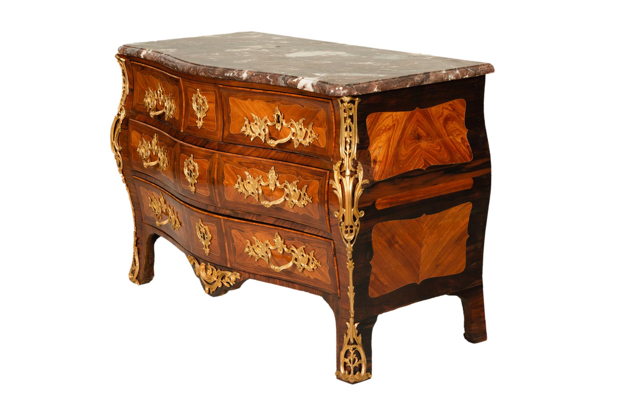 A Louis XV Gilt Bronze Mounted Kingwood and Tulipwood Marble Top Bombé Commode