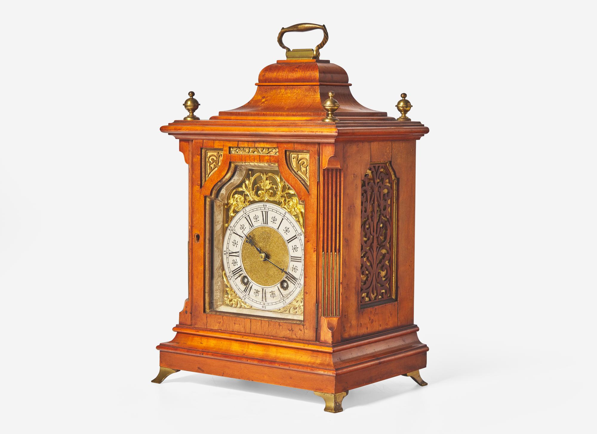 A Scottish Gilt Brass Mounted and Pierce Carved Walnut Mantel Clock