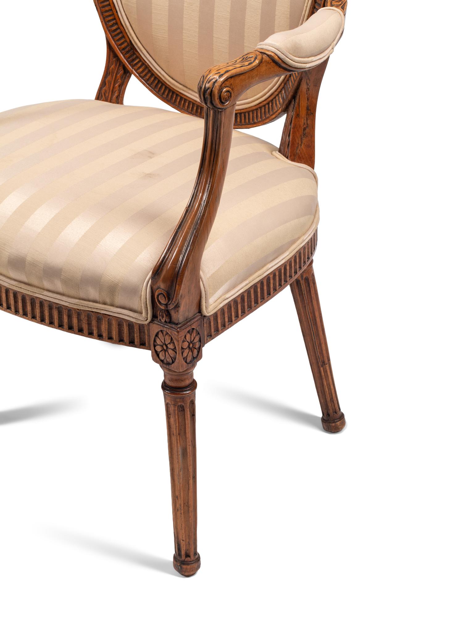 A Pair of George III Fruitwood Armchairs