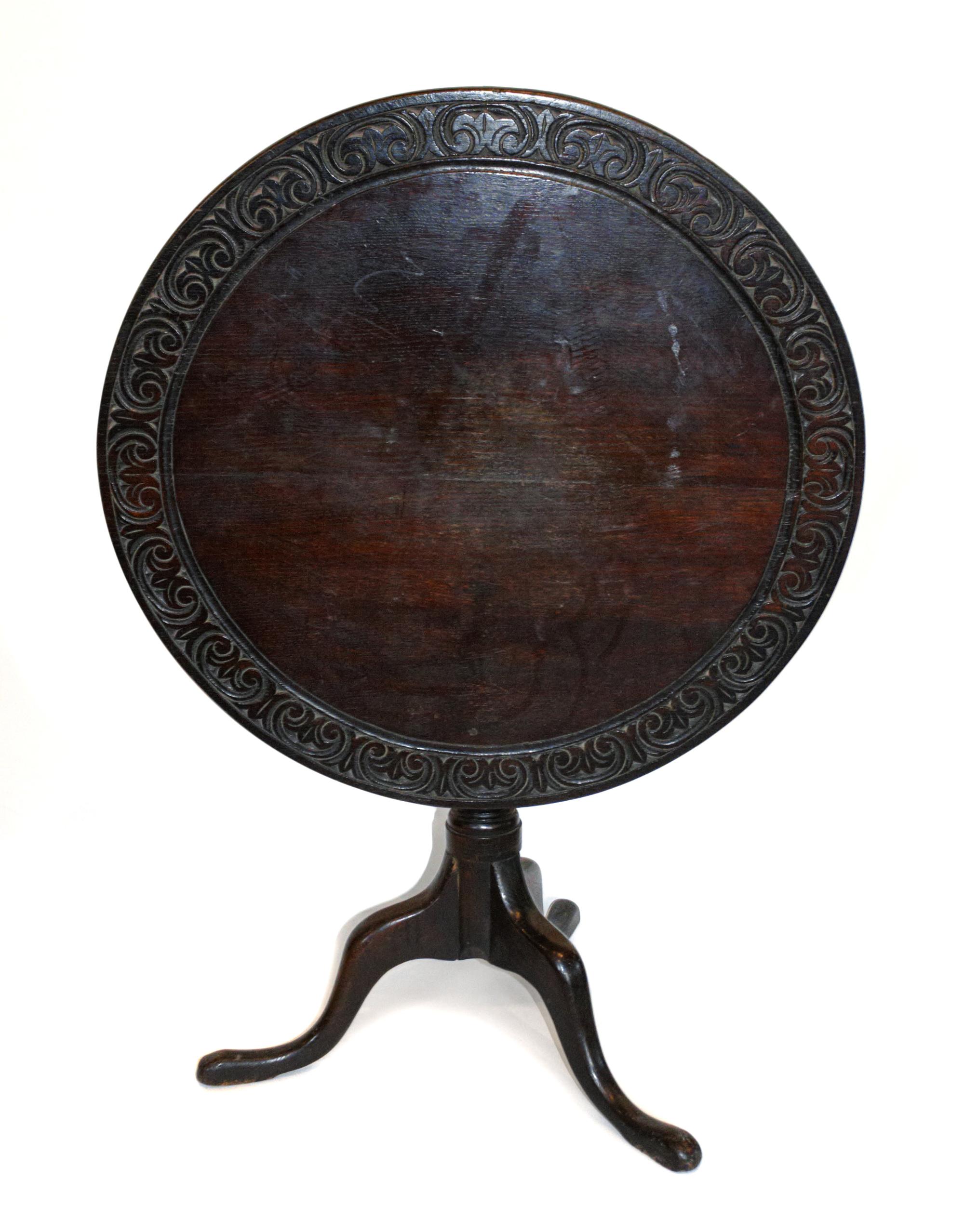 A Victorian Style Carved Oak Tilt-Top Tea Table