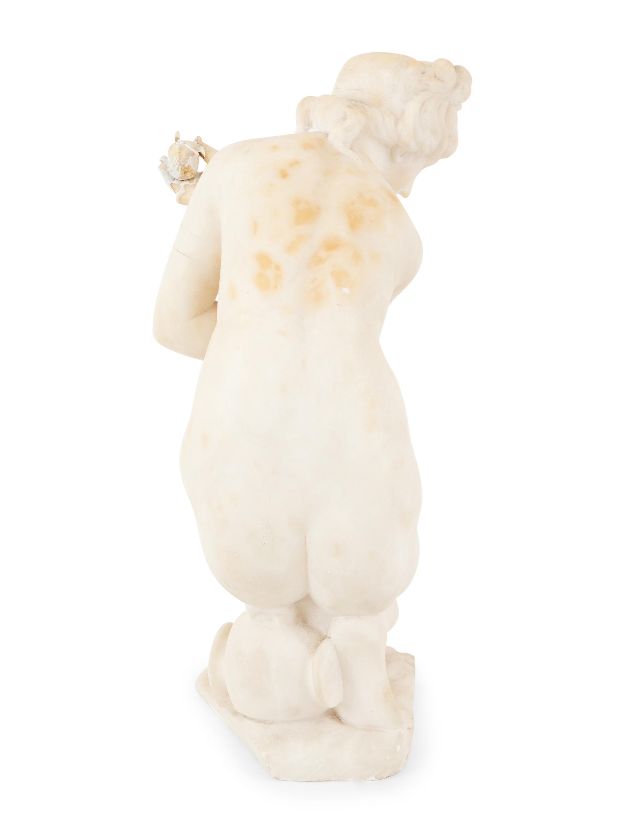 A Continental Alabaster Crouching Venus