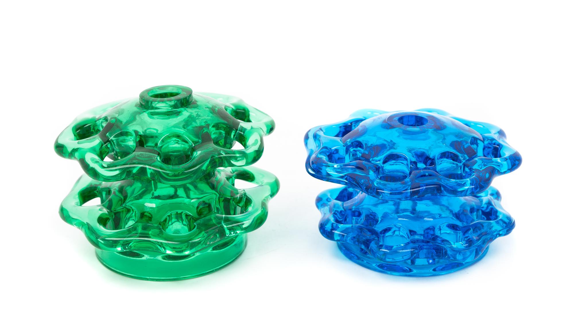 Steuben, 20TH CENTURY, two glass flower frogs