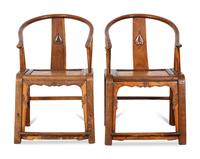 A Pair of Ming Style Elm Horseshoe Back Armchairs