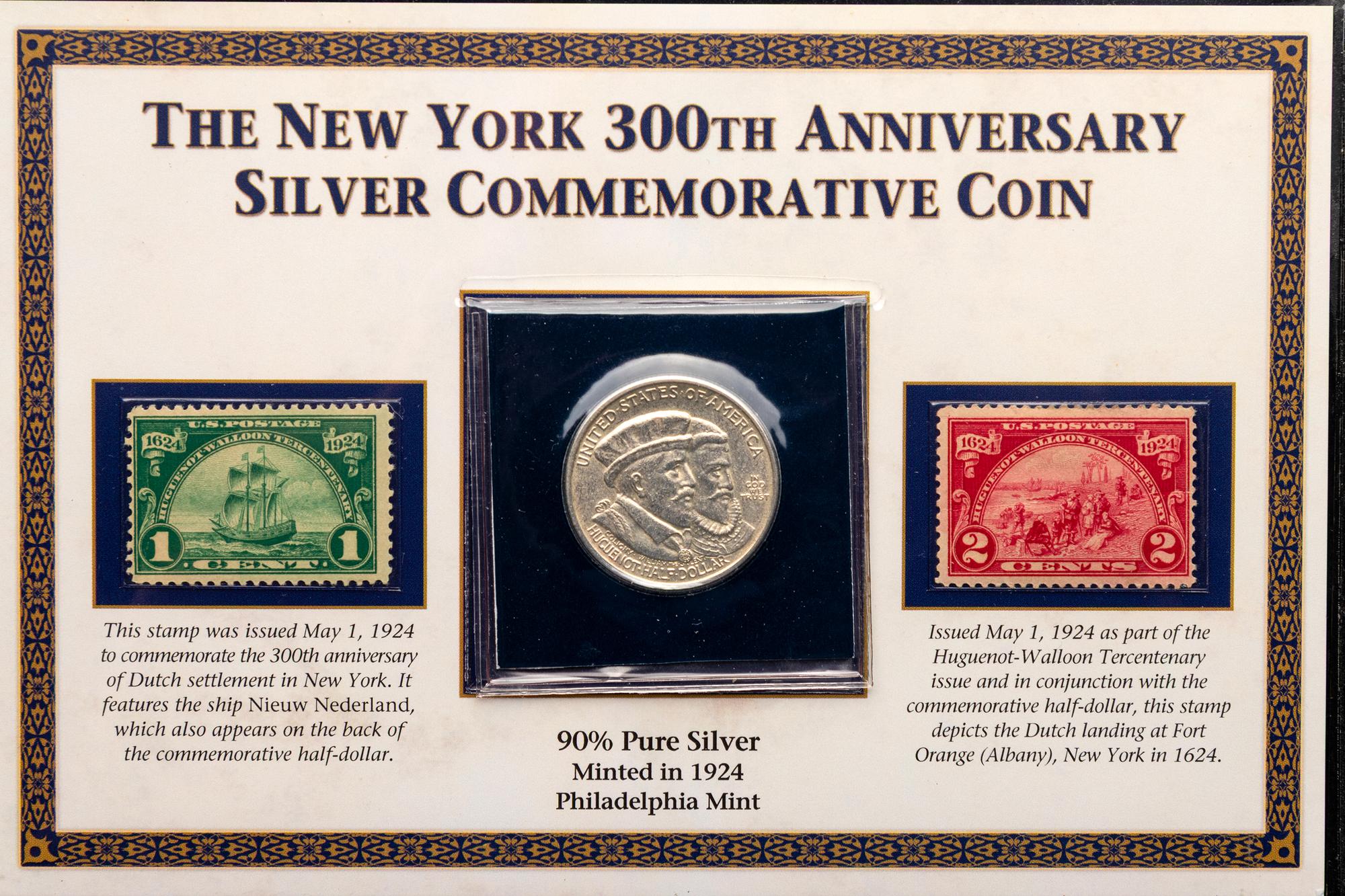 A Group of Four Commemorative 50c Coin and Stamp Sets