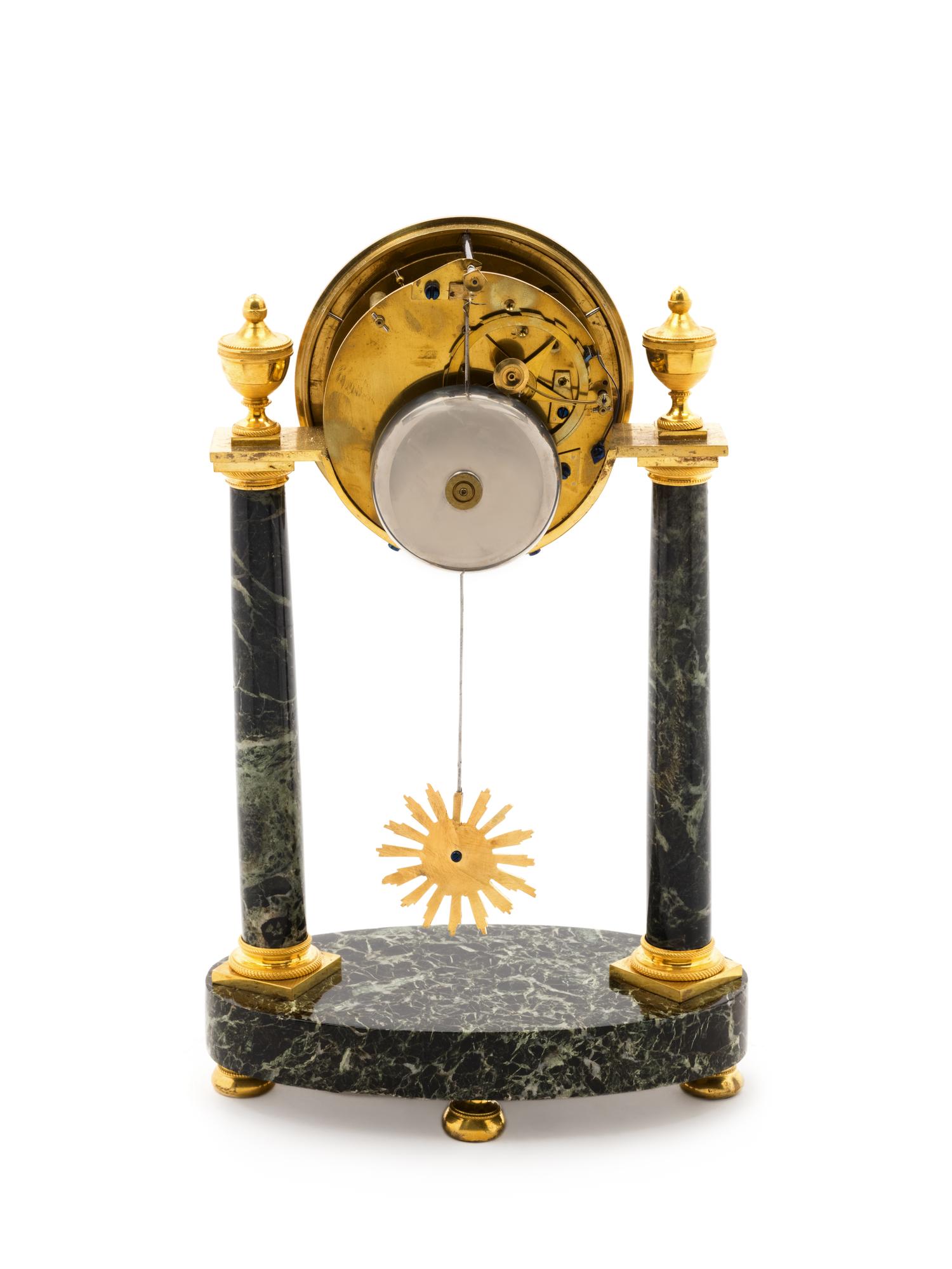 A Directoire Gilt Bronze and Marble Mantel Clock