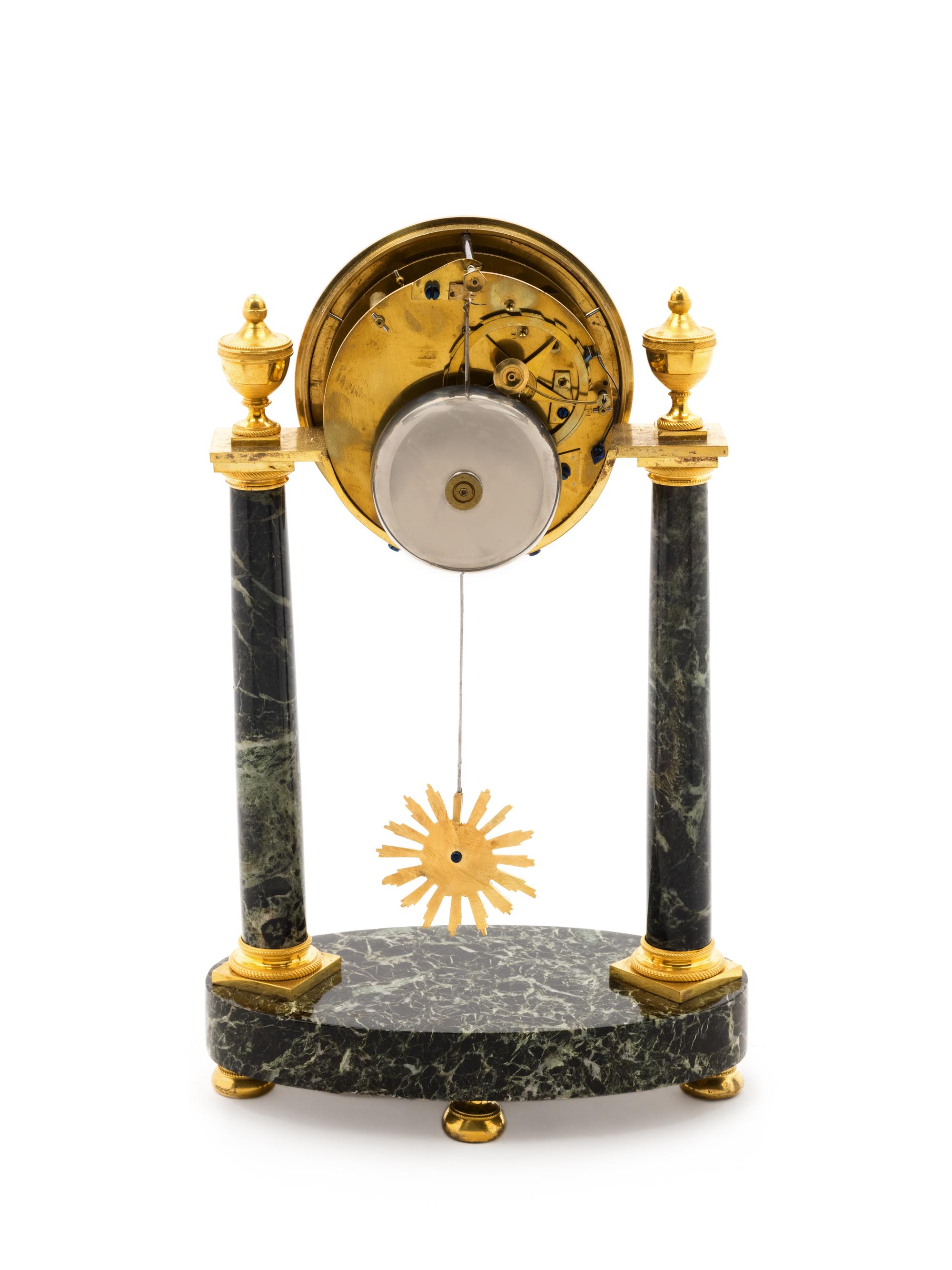 A Directoire Gilt Bronze and Marble Mantel Clock