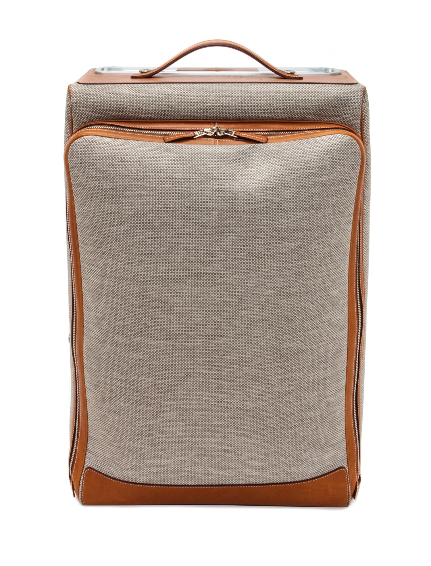 An Hermes Ecru Canvas and Fawn Barenia Calfskin Caleche-Express Suitcase, 14" x 21.5" x 10".