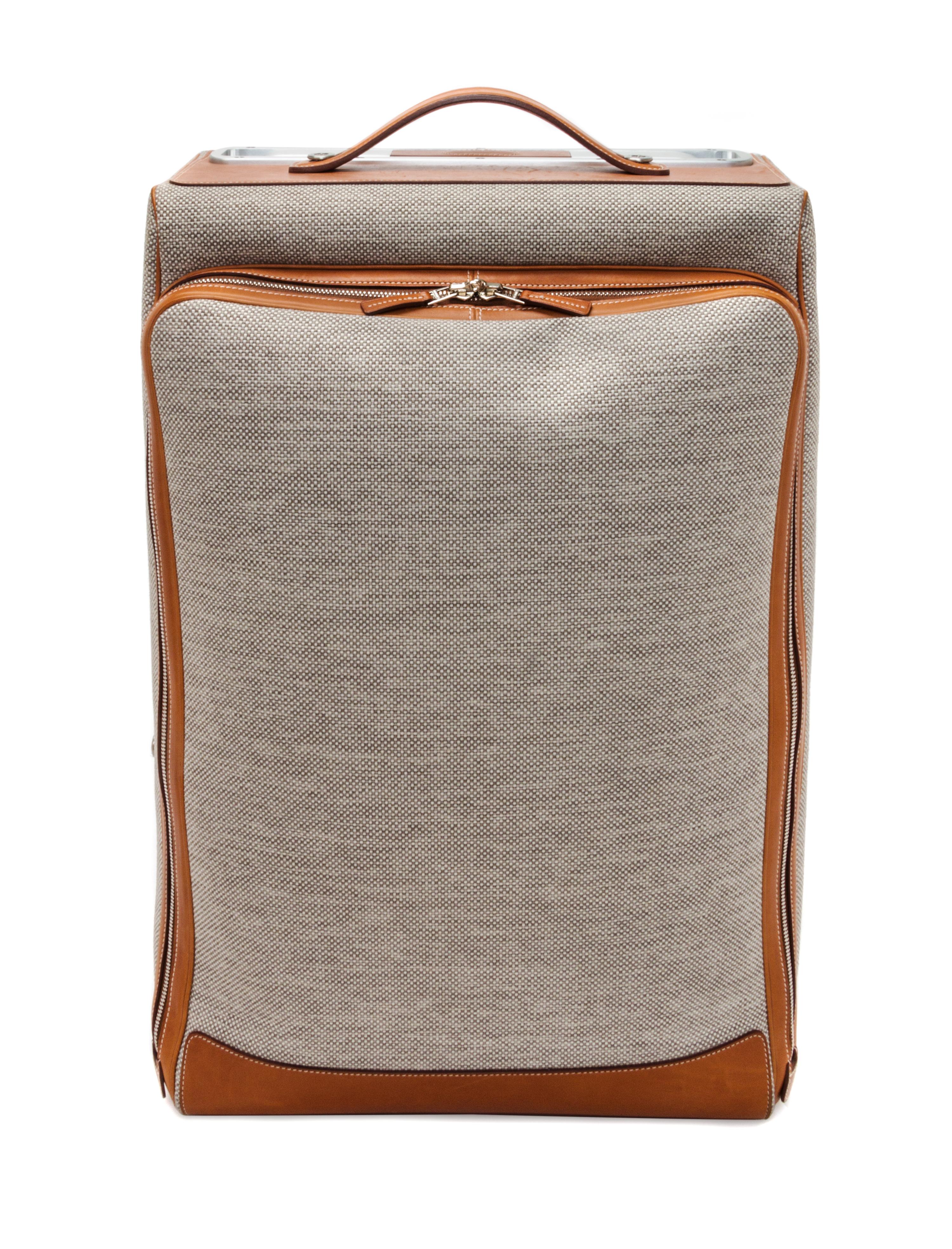 An Hermes Ecru Canvas and Fawn Barenia Calfskin Caleche-Express Suitcase, 14" x 21.5" x 10".