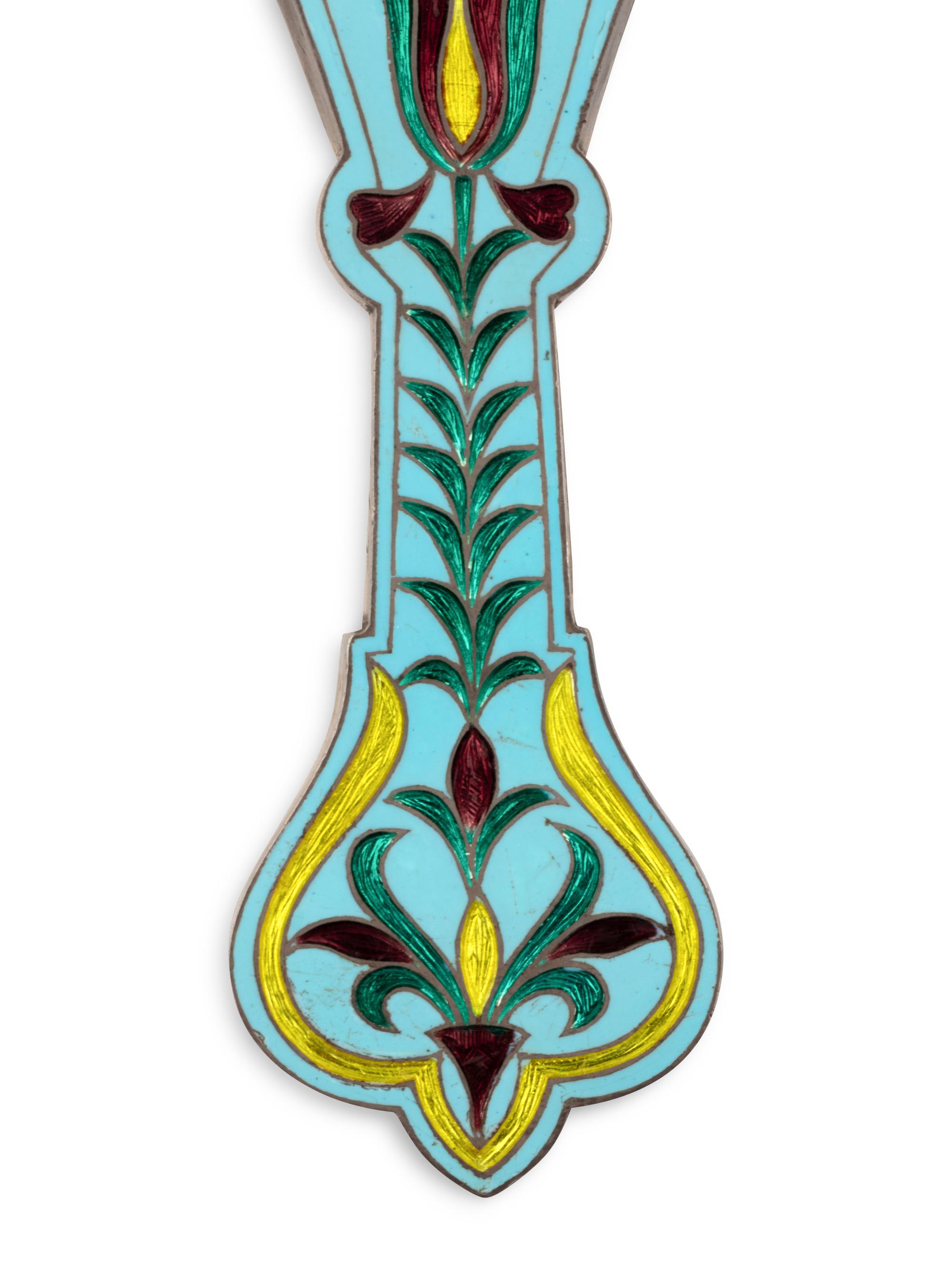 An East Indian Silver and Enamel Hand Mirror