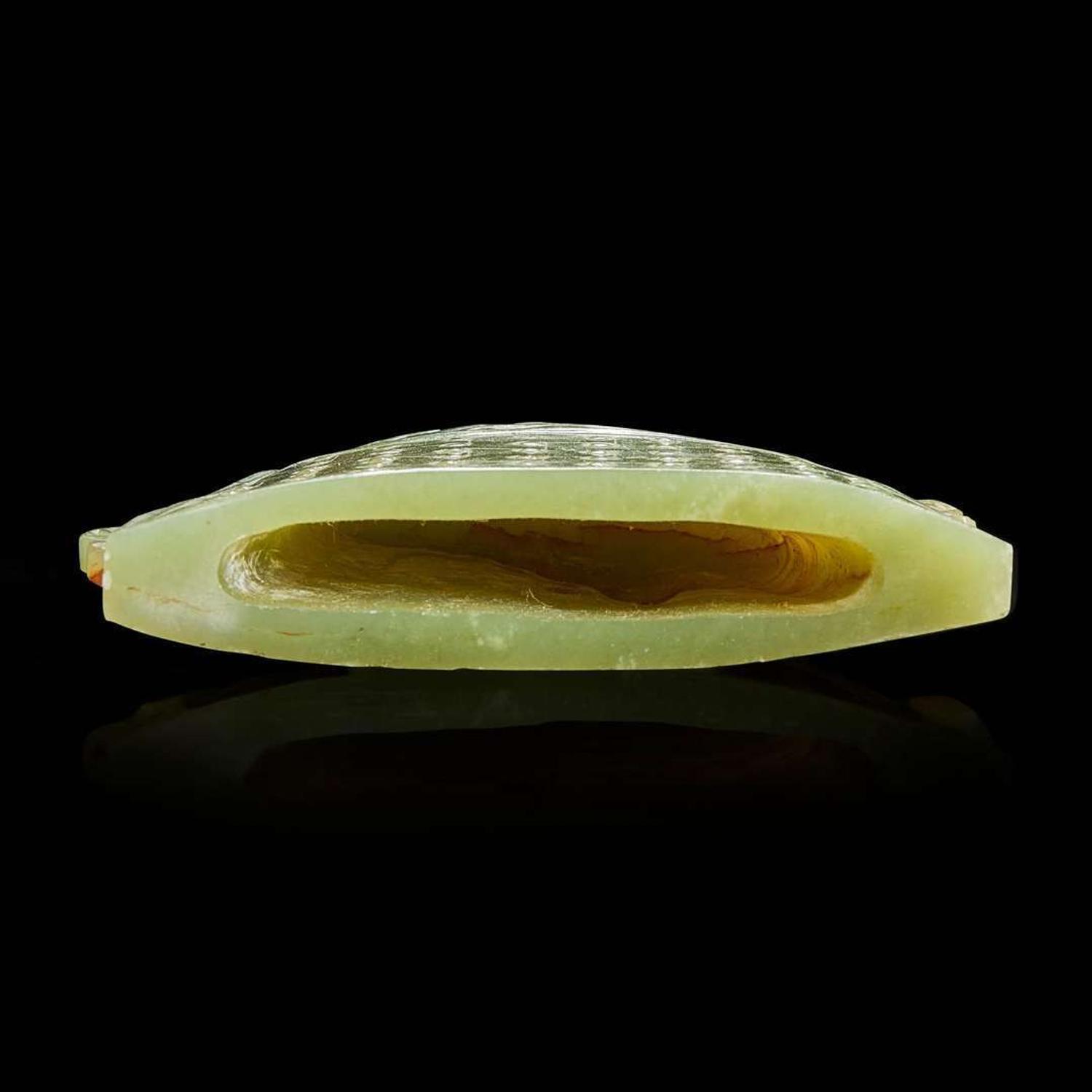 A Chinese white jade pendant and celadon jade "bell" 白玉牌饰和青玉钟一组