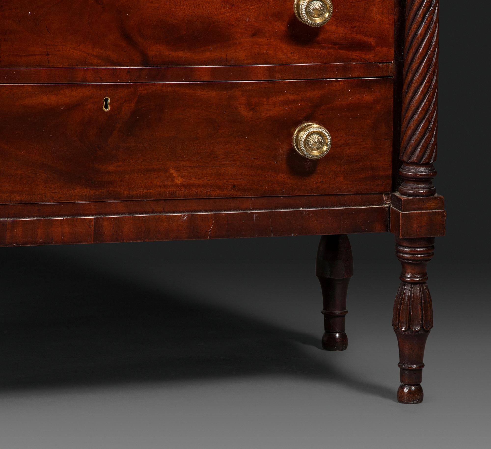 A Federal Carved and Figured Mahogany Lady's Writing Desk