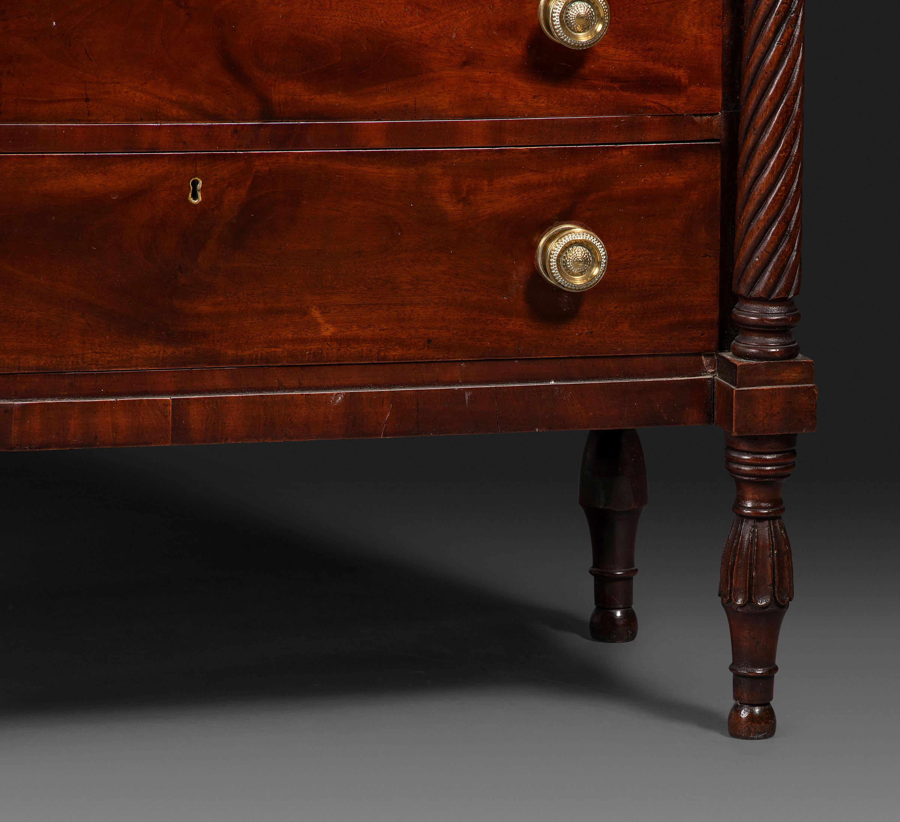 A Federal Carved and Figured Mahogany Lady's Writing Desk