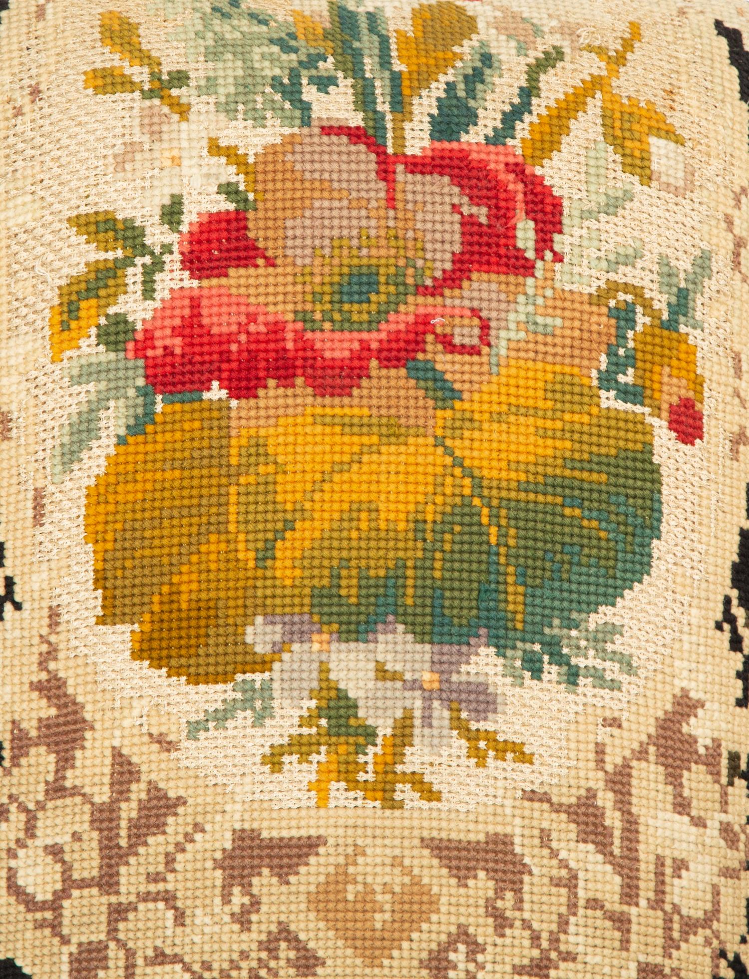 A Pair of Danish Walnut Slipper Chairs with Needlepoint Upholstery