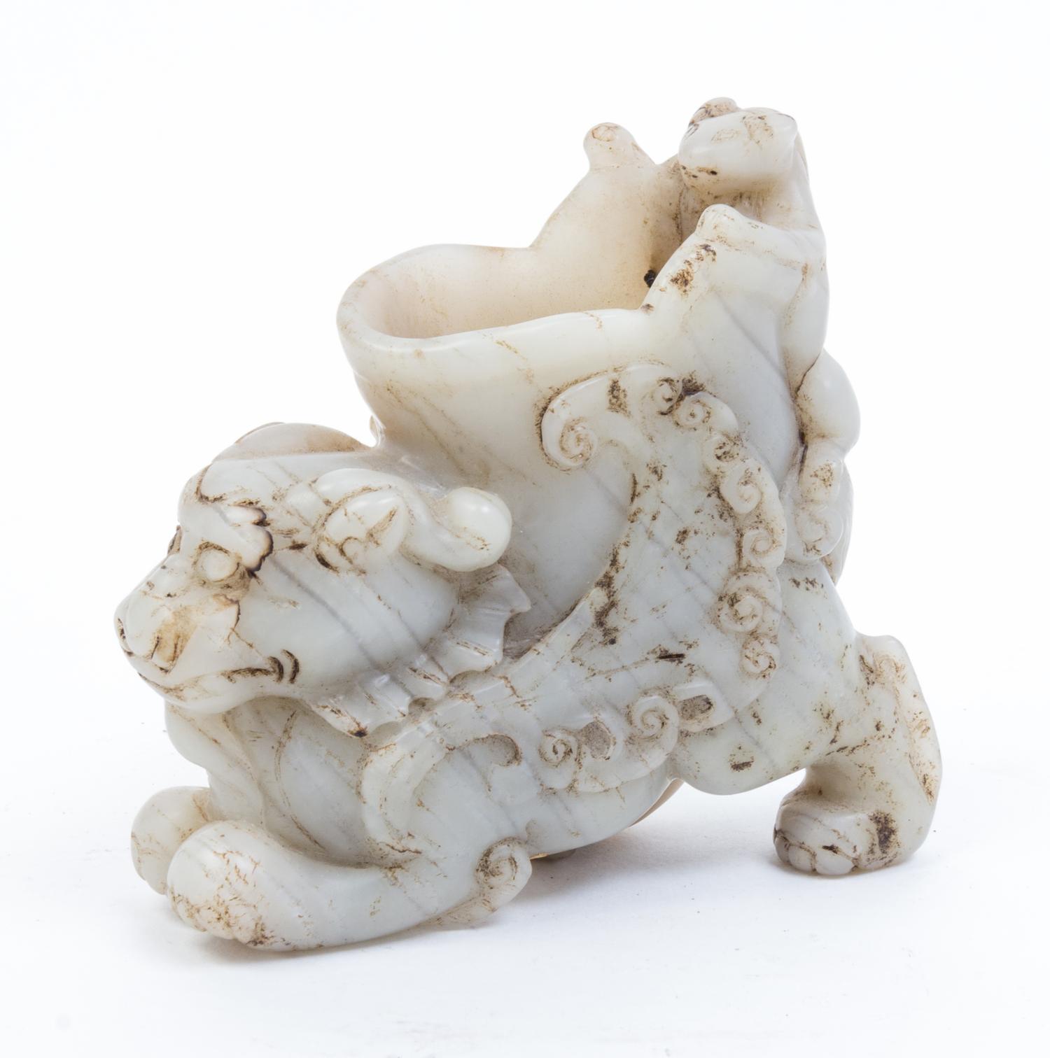 A Carved Hardstone Vase Width 4 7/8 inches.