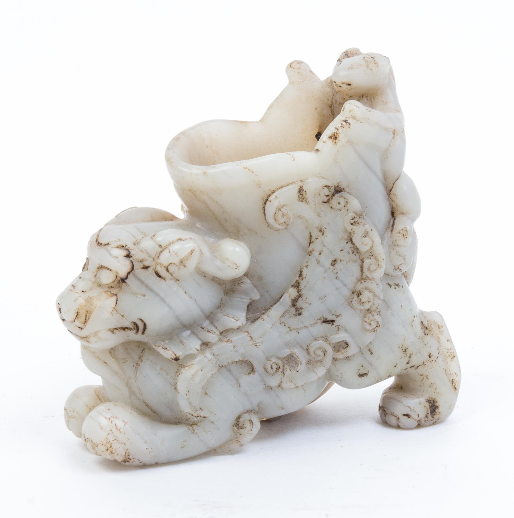 A Carved Hardstone Vase Width 4 7/8 inches.