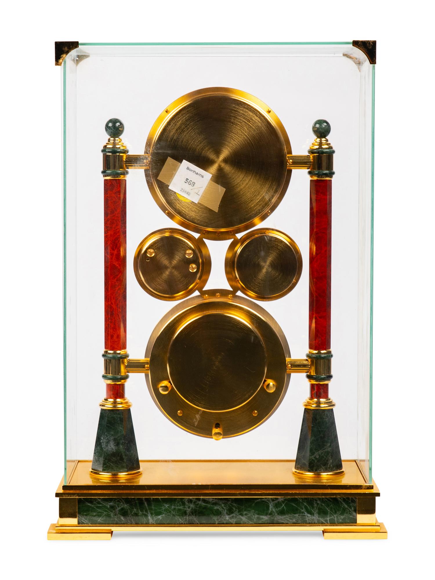 A Swiss Gilt Metal and Marble Mantel Clock
