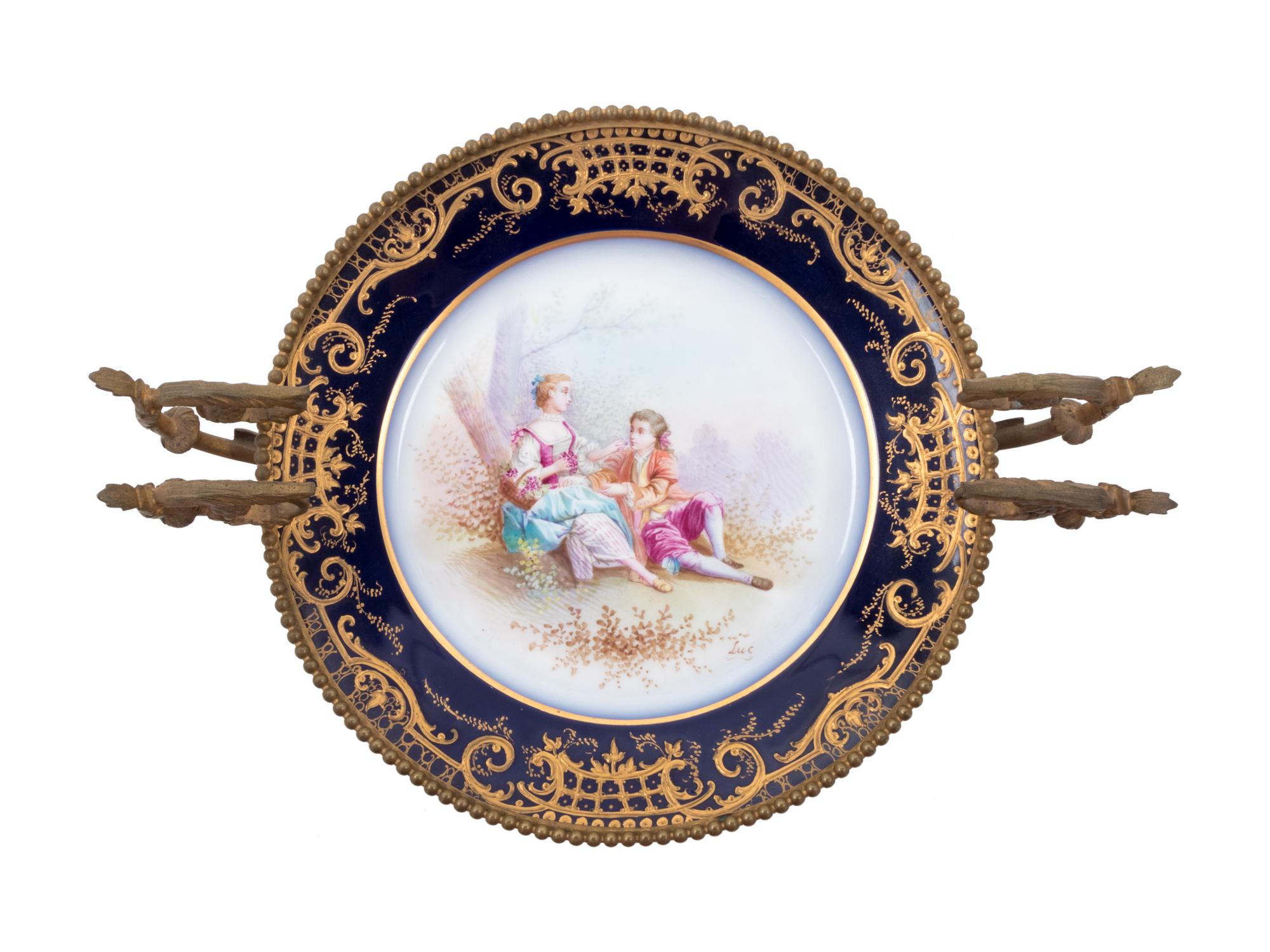 A Sèvres Style Bronze Mounted Painted and Parcel Gilt Porcelain Compote