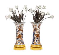 A Pair of Gilt Bronze Mounted Imari Palette Porcelain Vases with Biscuit Porcelain Tulip Arrangements