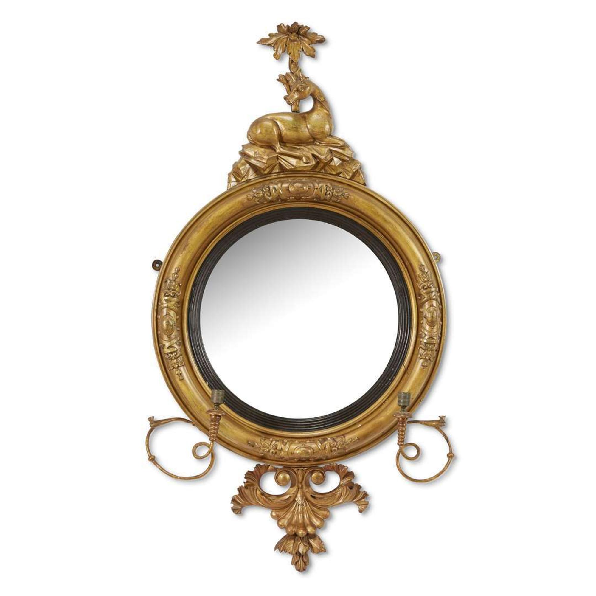 Classical carved giltwood girandole bull's-eye looking glass early 19th century