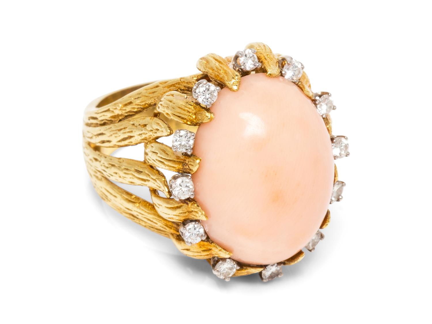 An 18 Karat Bicolor Gold, Angel Skin Coral and Diamond Ring,