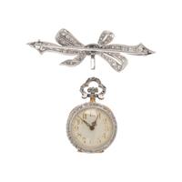 DIAMOND AND PLATINUM LAPEL WATCH