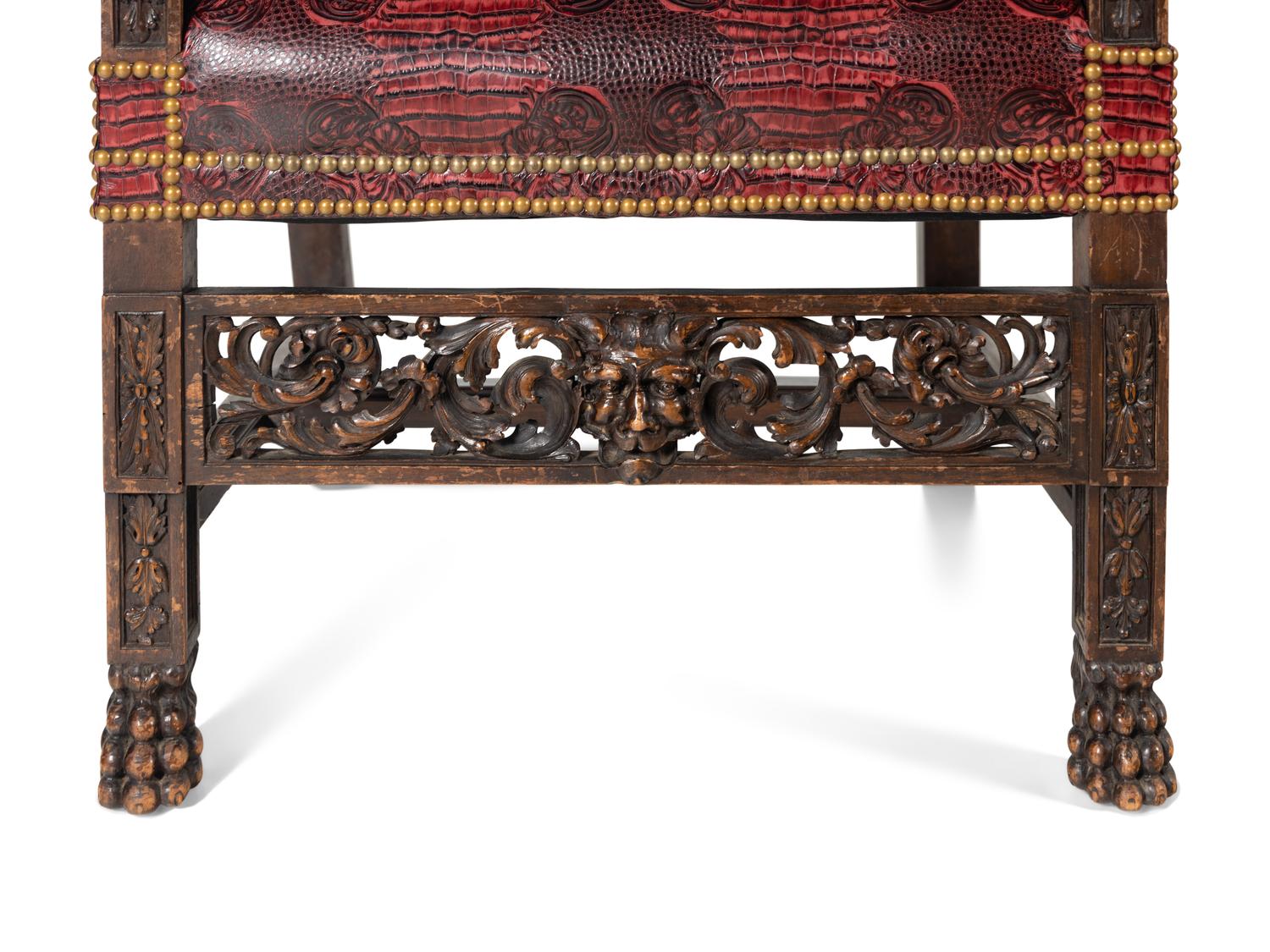 A Pair of Italian Renaissance Revival Carved Walnut Armchairs