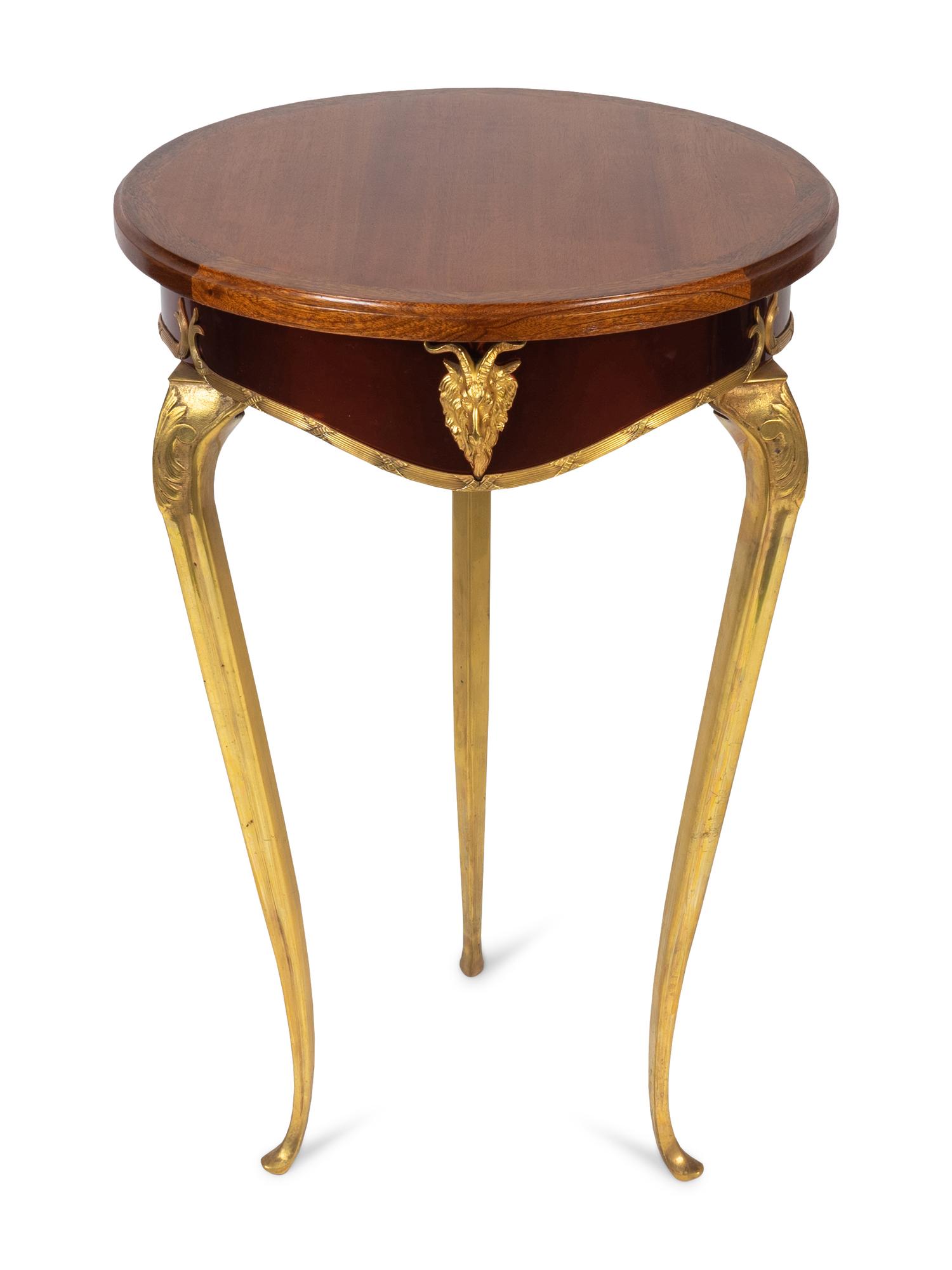 A French Empire Style Gilt Metal Mounted Mahogany Top Side Table — 20TH CENTURY