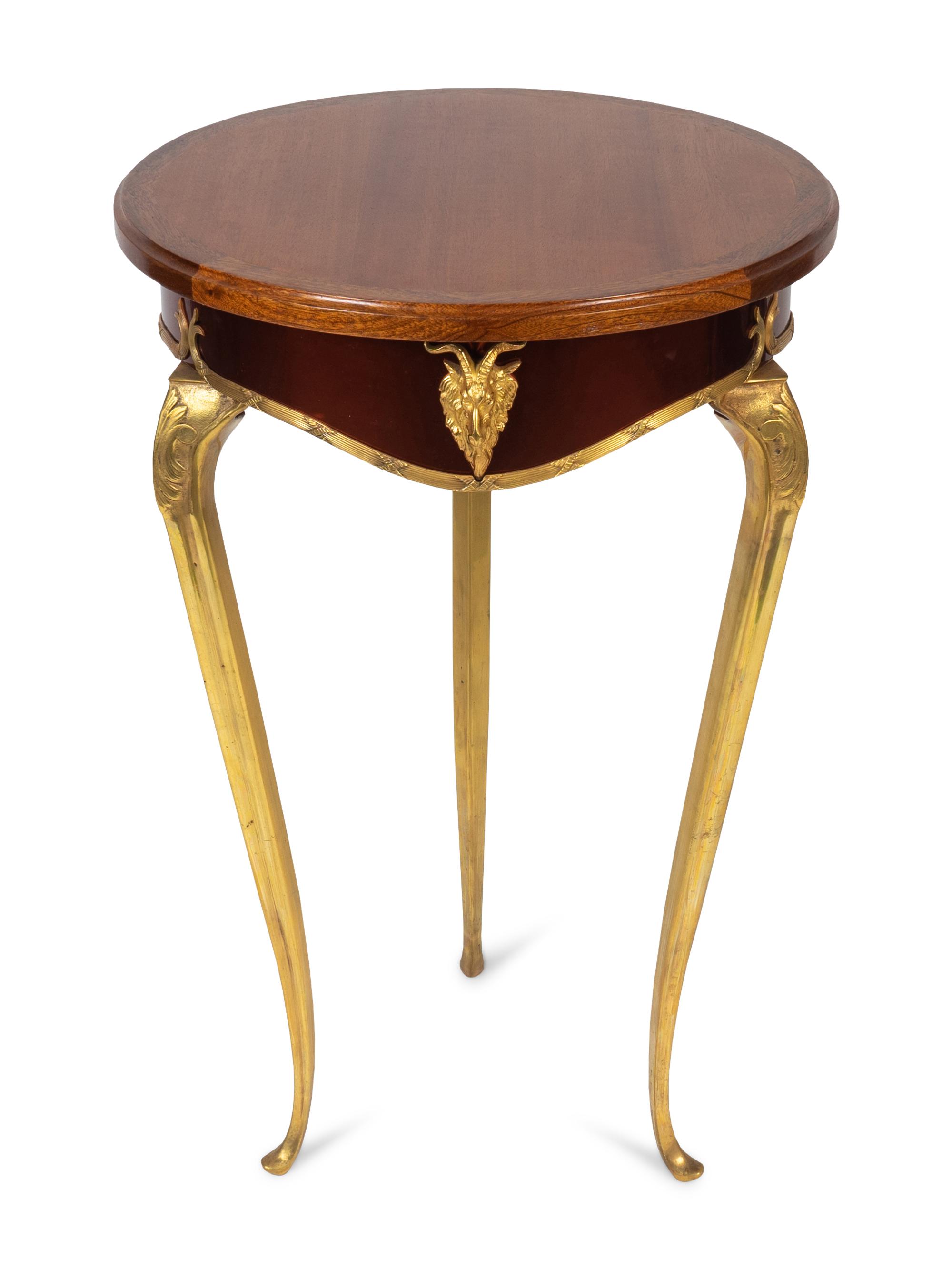 A French Empire Style Gilt Metal Mounted Mahogany Top Side Table — 20TH CENTURY