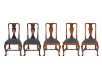 An Assemblage of Five Queen Anne Cherry and Mahogany Dining Chairs