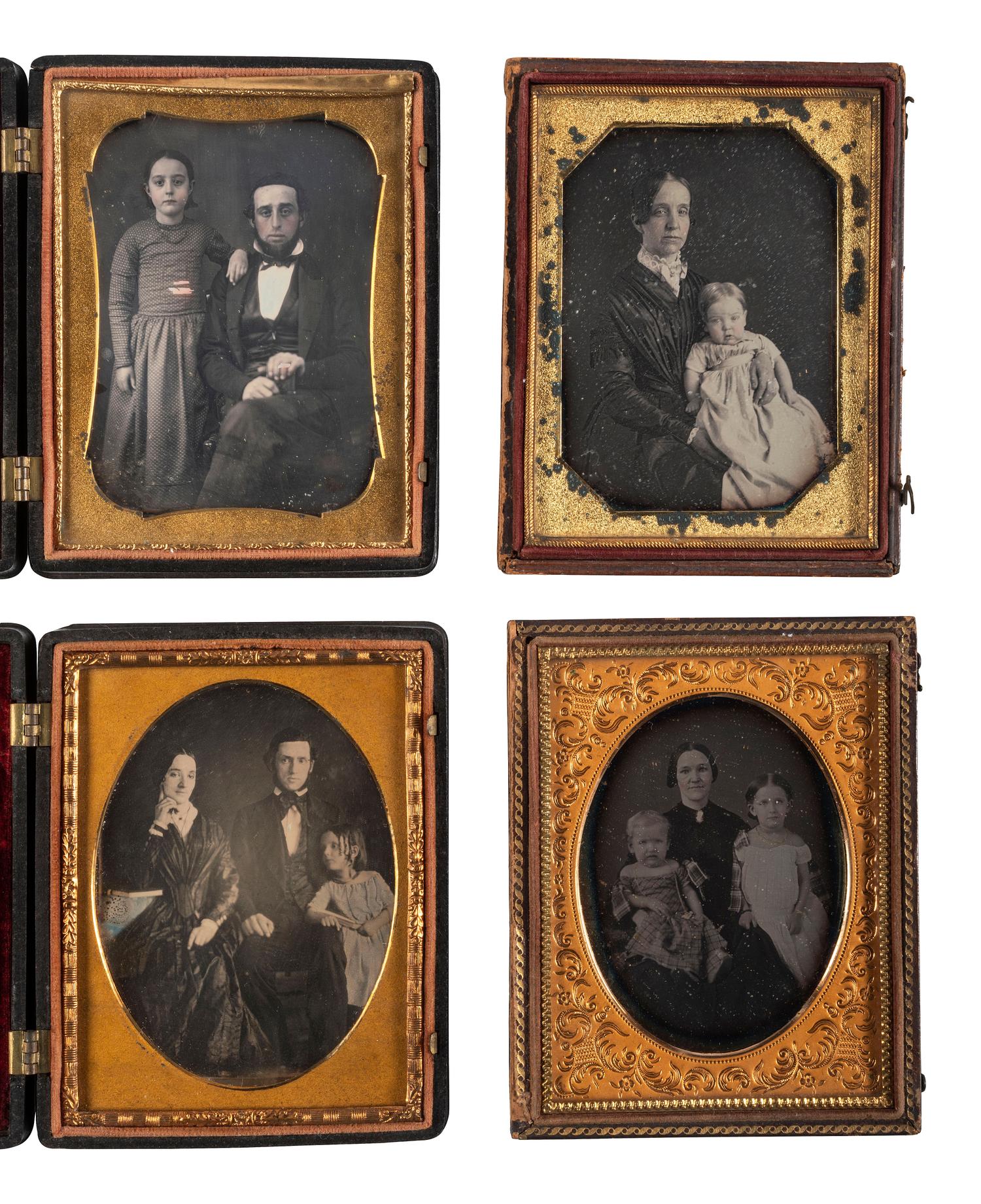 [EARLY PHOTOGRAPHY]. A group of 22 daguerreotype and tintype portraits of parents with children, including: