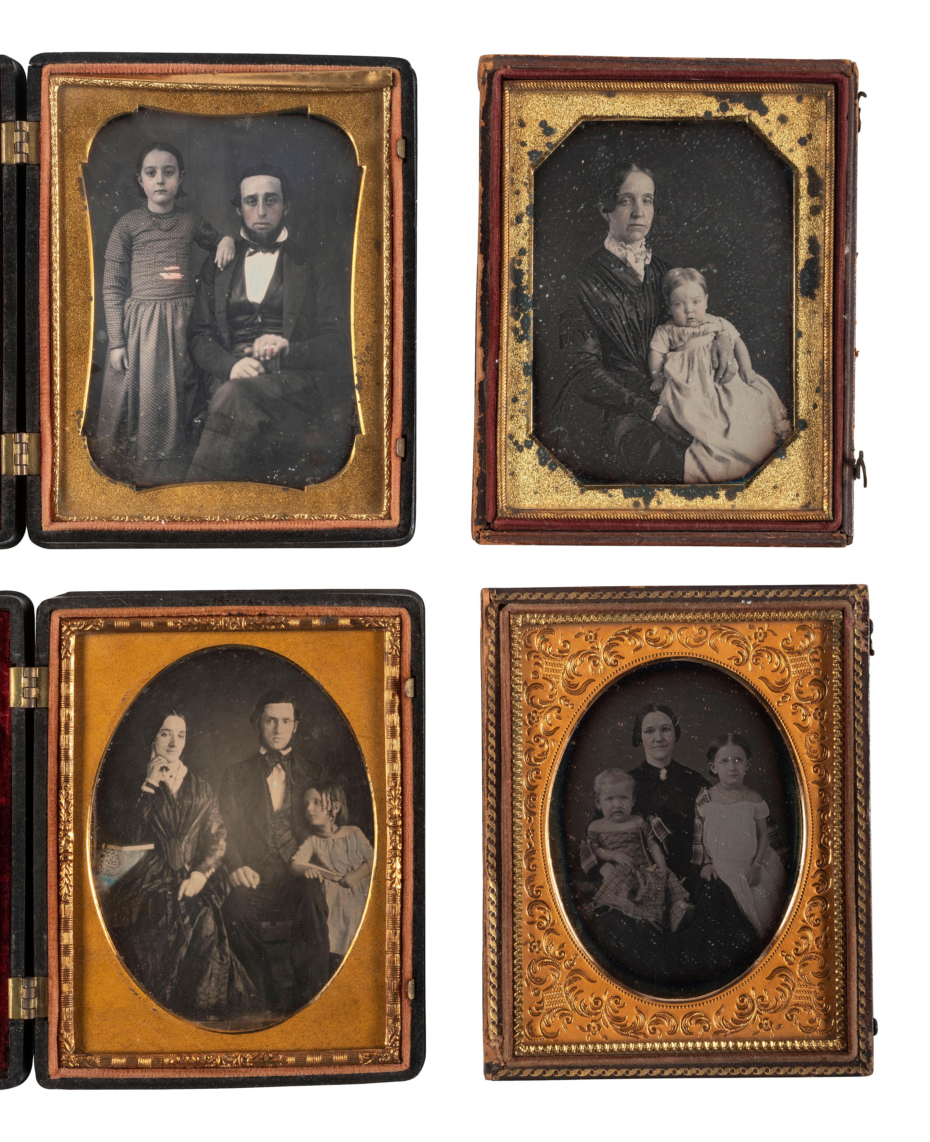 [EARLY PHOTOGRAPHY]. A group of 22 daguerreotype and tintype portraits of parents with children, including: