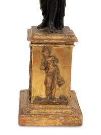 A Pair of Continental Carved, Parcel Ebonized and Gilt Wood Neoclassical Figures