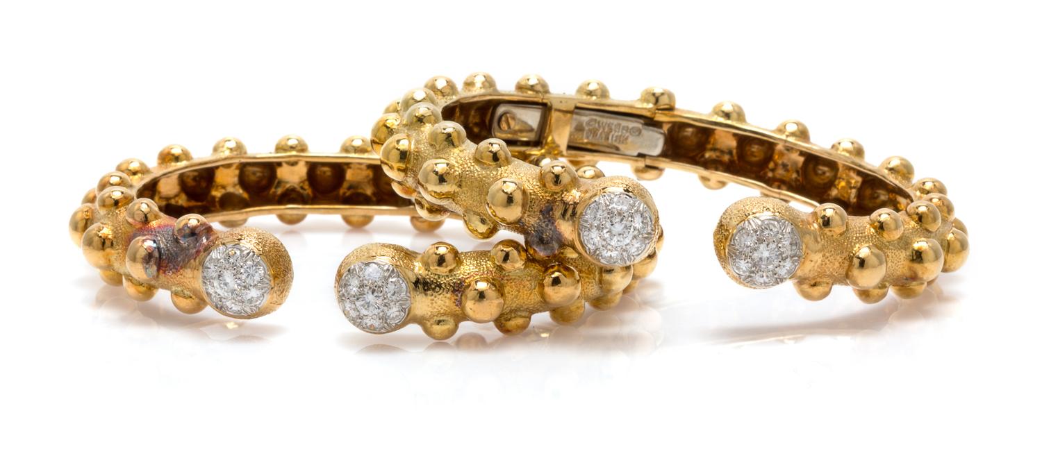 A Pair of 18 Karat Yellow Gold, Platinum and Diamond Bangle Bracelets, David Webb, 26.20 dwts.