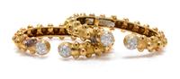 A Pair of 18 Karat Yellow Gold, Platinum and Diamond Bangle Bracelets, David Webb, 26.20 dwts.