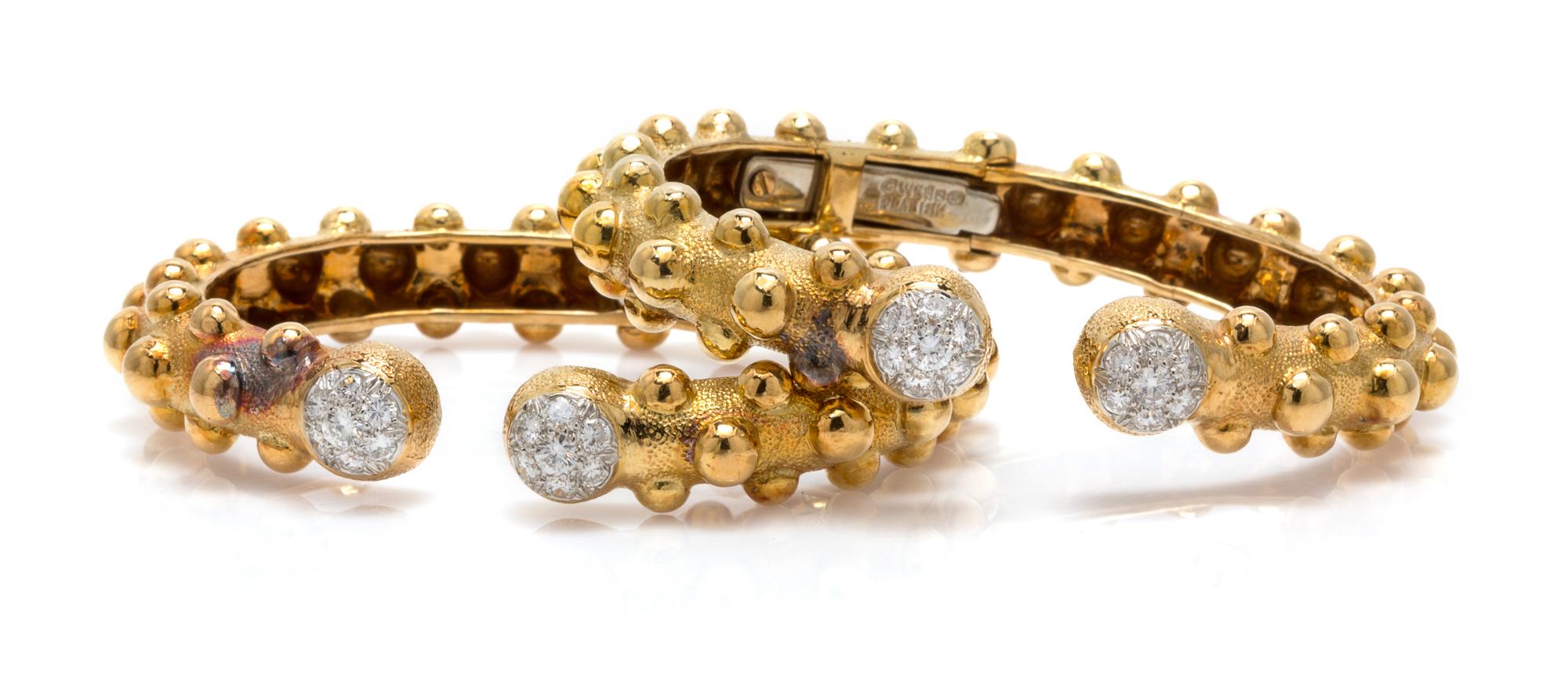 A Pair of 18 Karat Yellow Gold, Platinum and Diamond Bangle Bracelets, David Webb, 26.20 dwts.