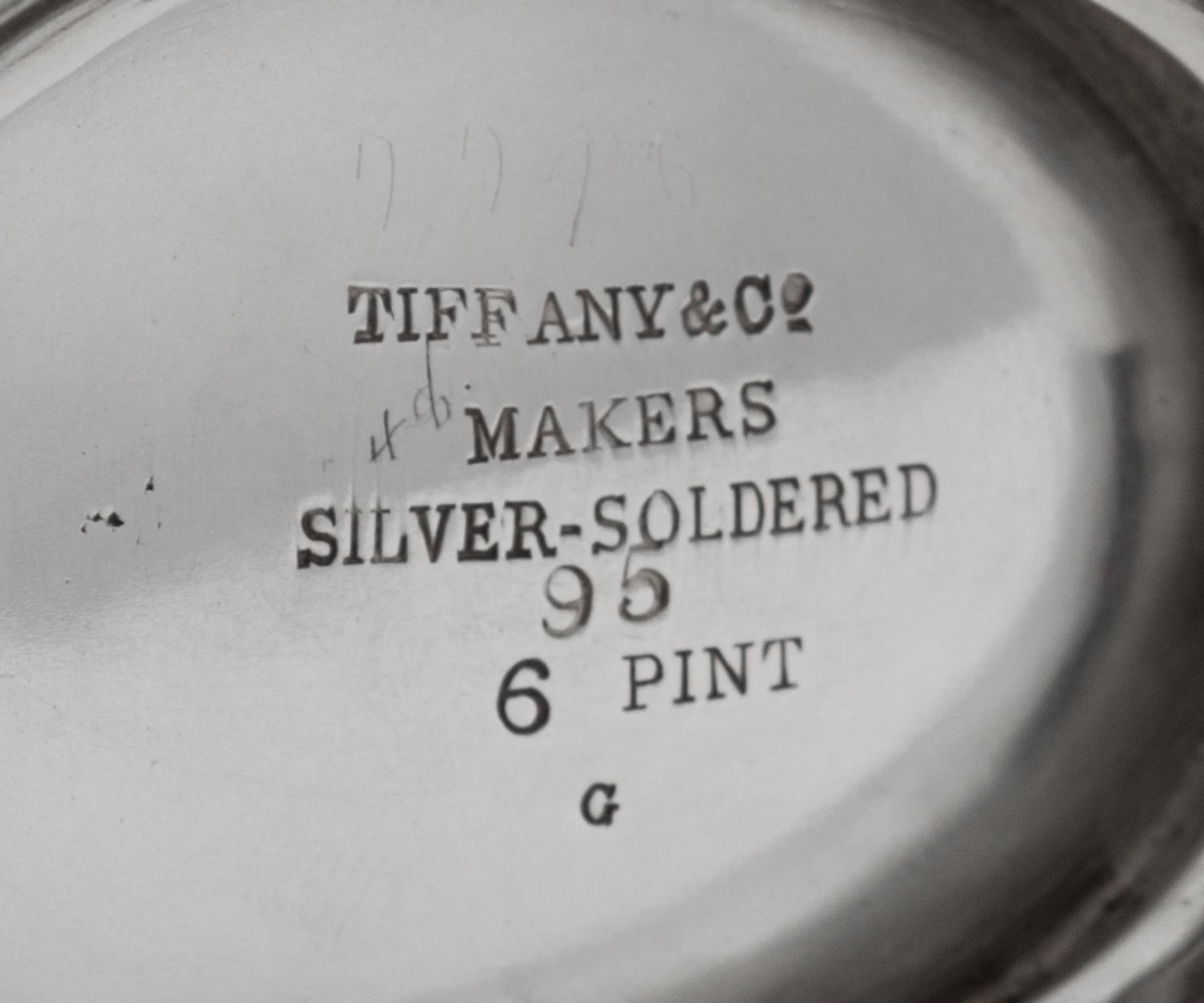 An American Silver-Plate Tureen, Tiffany & Co., New York, NY, Early 20th Century, the lid and body with bands of repousse floral and fo