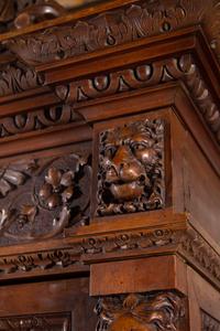 An Italian Renaissance Style Carved Walnut Cabinet