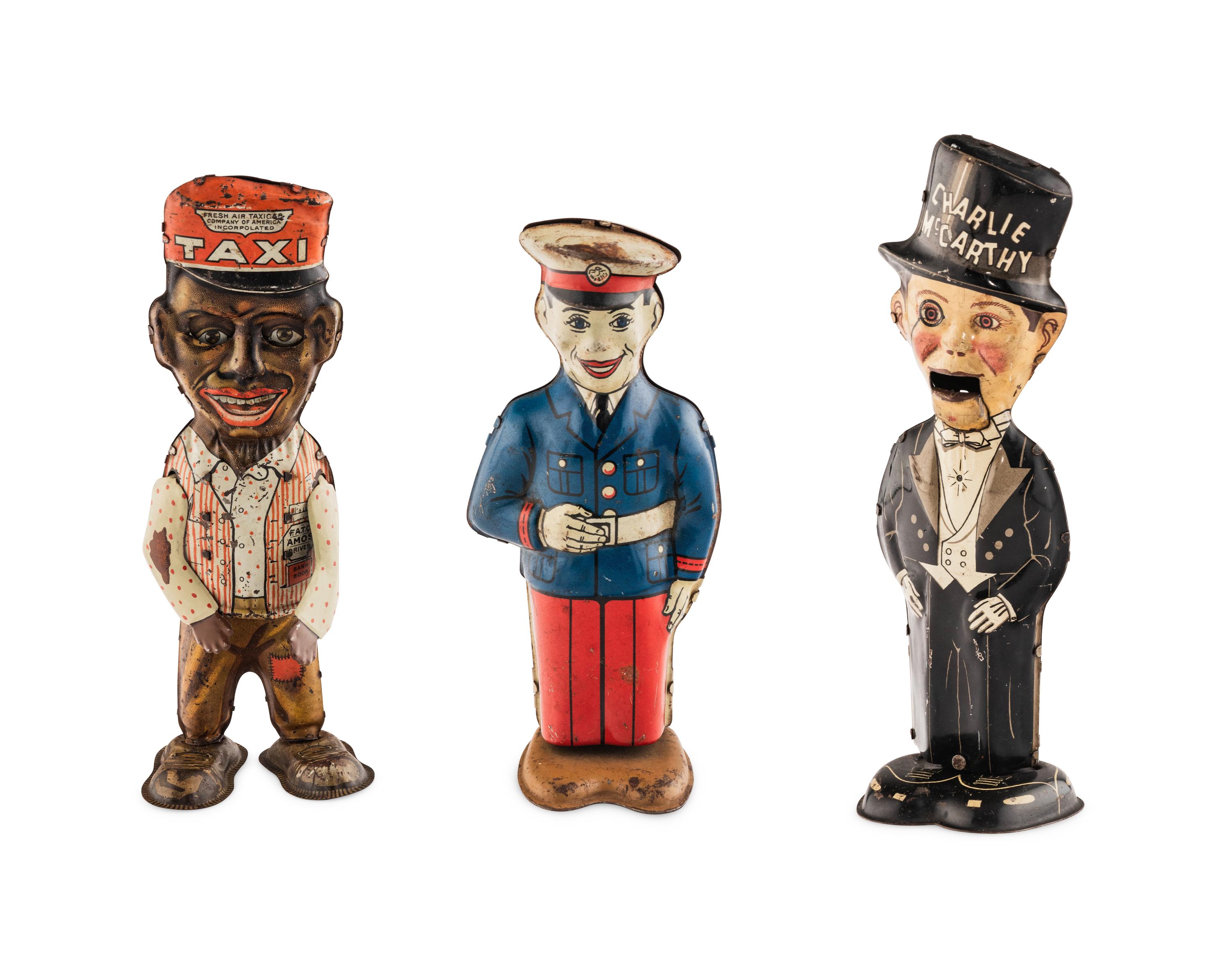 A Group of Three Tin Lithograph Walker Toys