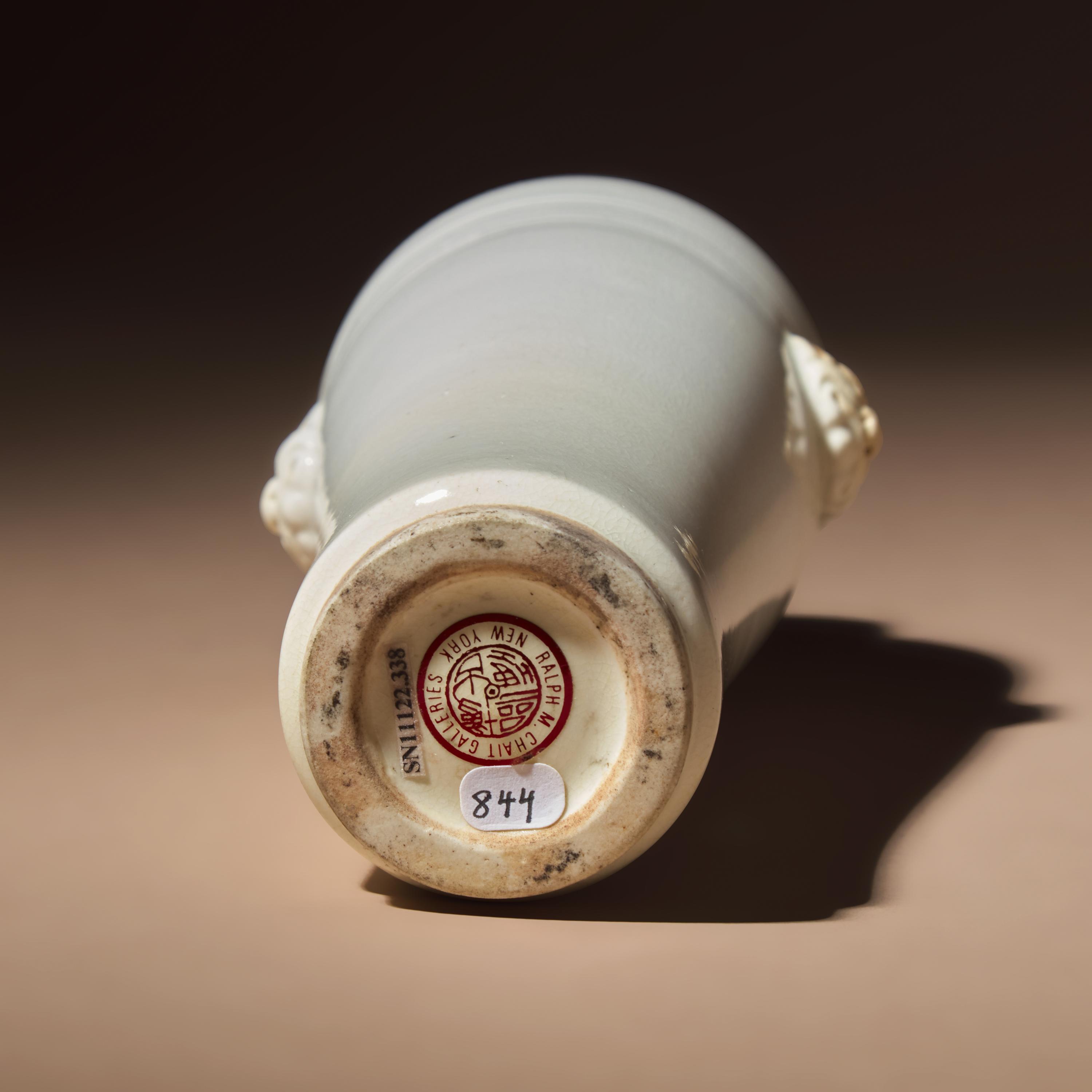 A Chinese Blanc-de-Chine Porcelain Sleeve Vase, 17th-18th Century — 清早期 德化白瓷雙輔首耳弦紋筒瓶
