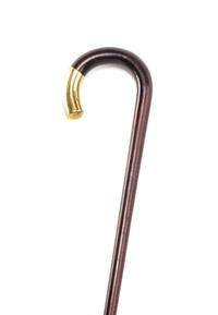 A 14 Karat Gold Capped Cane, Length of cap 2 1/2 x length overall 34 1/2 inches.