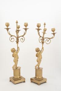 A Pair of Louis XV Style Gilt Metal Three-Light Candelabra