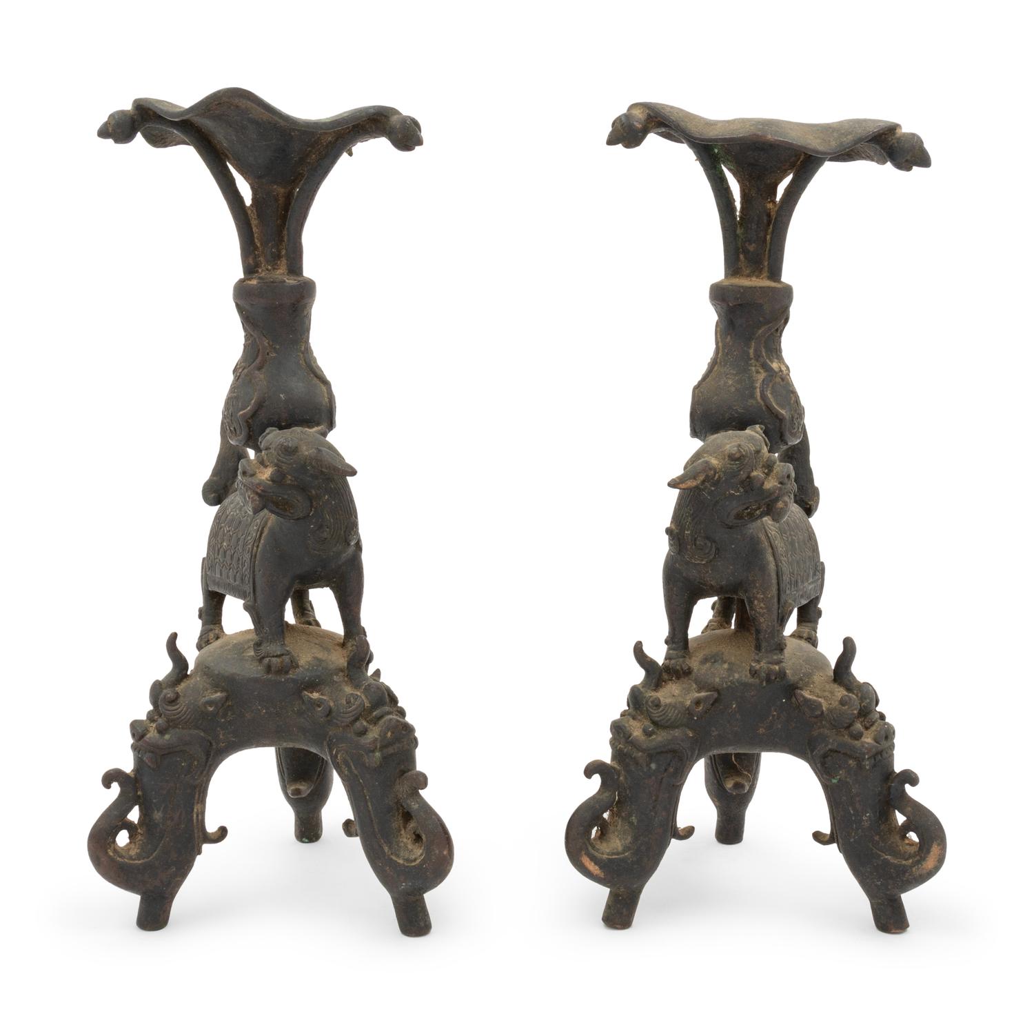 A Pair of Japanese Bronze Mythical Beast-Form Candle Holders