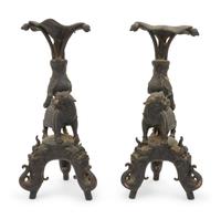 A Pair of Japanese Bronze Mythical Beast-Form Candle Holders