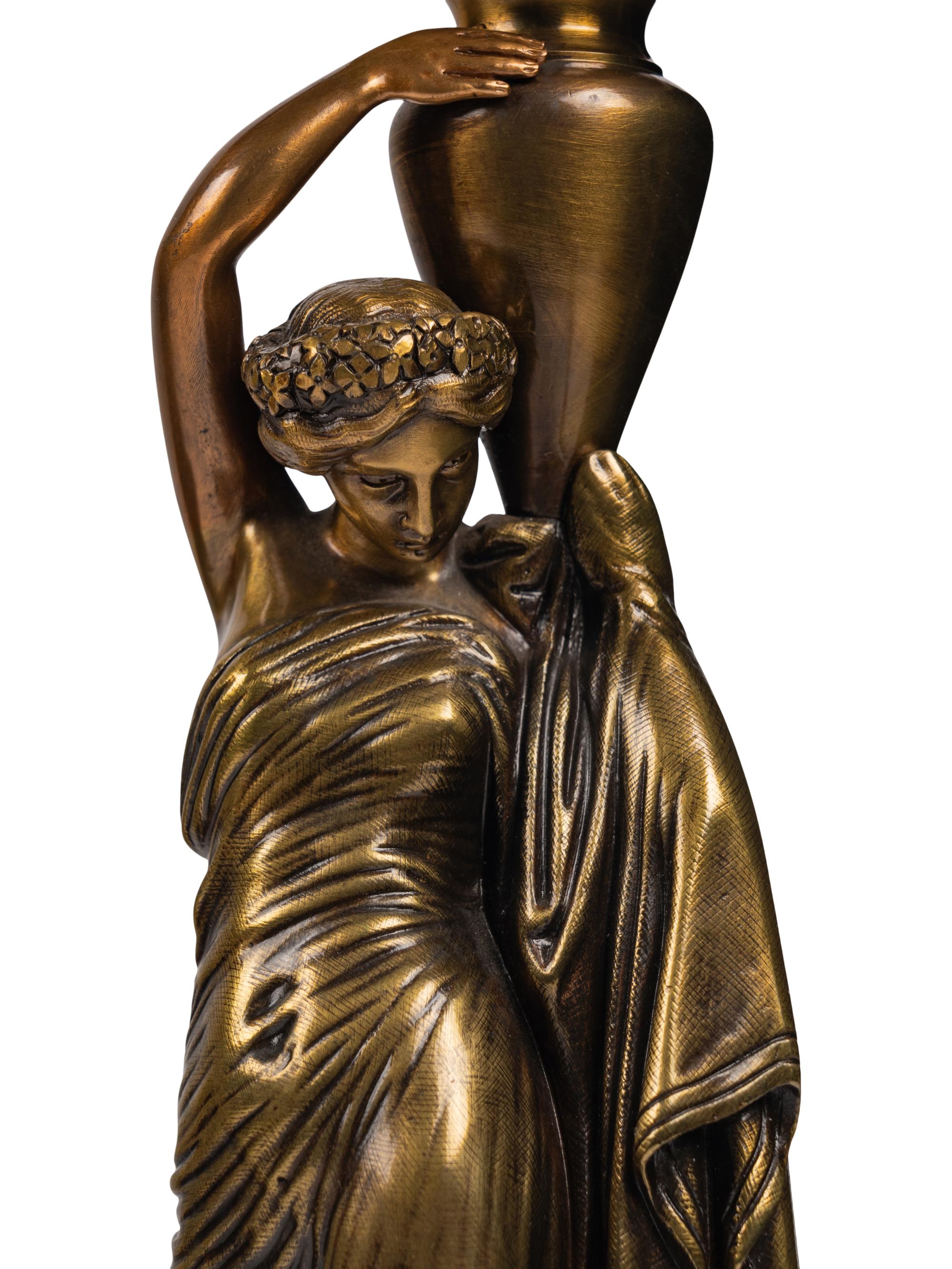 A French Neoclassical Gilt Bronze and Rouge Marble Clock Garniture