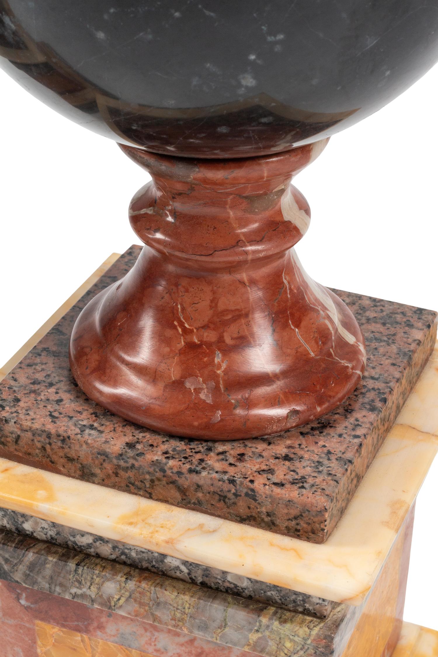 A Pair of Grand Tour Style Vari-Color Marble Ornaments