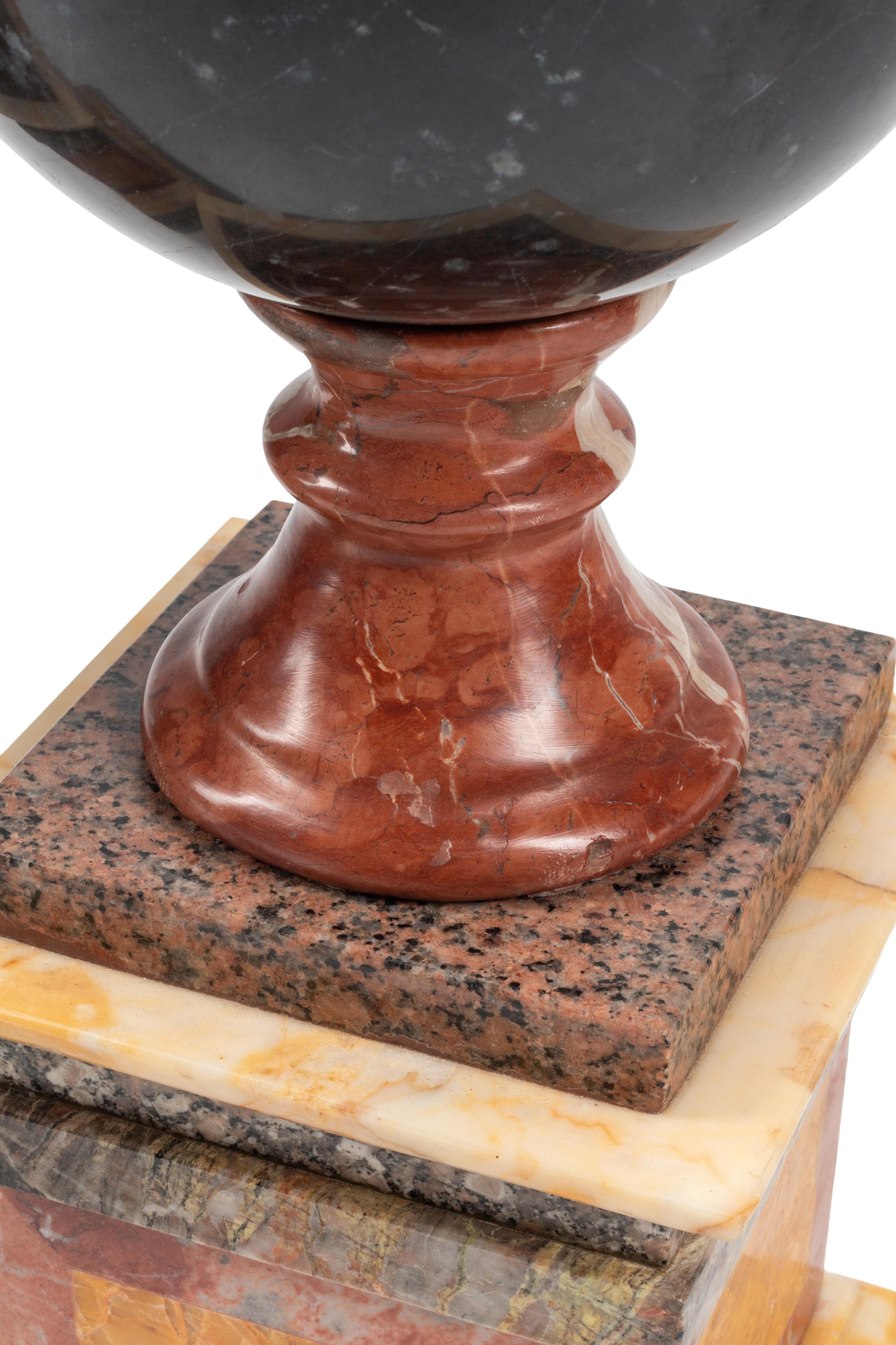 A Pair of Grand Tour Style Vari-Color Marble Ornaments
